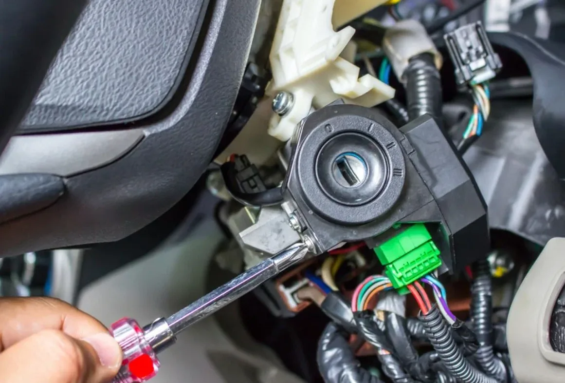 Car ignition cylinder repair - locksmith working on a vehicle in Port St. Lucie
